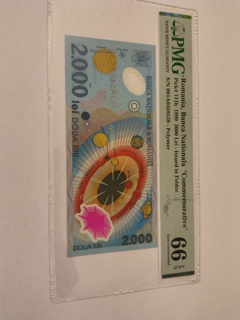 Bancnota de 2000 lei cu eclipsa gradata PMG66